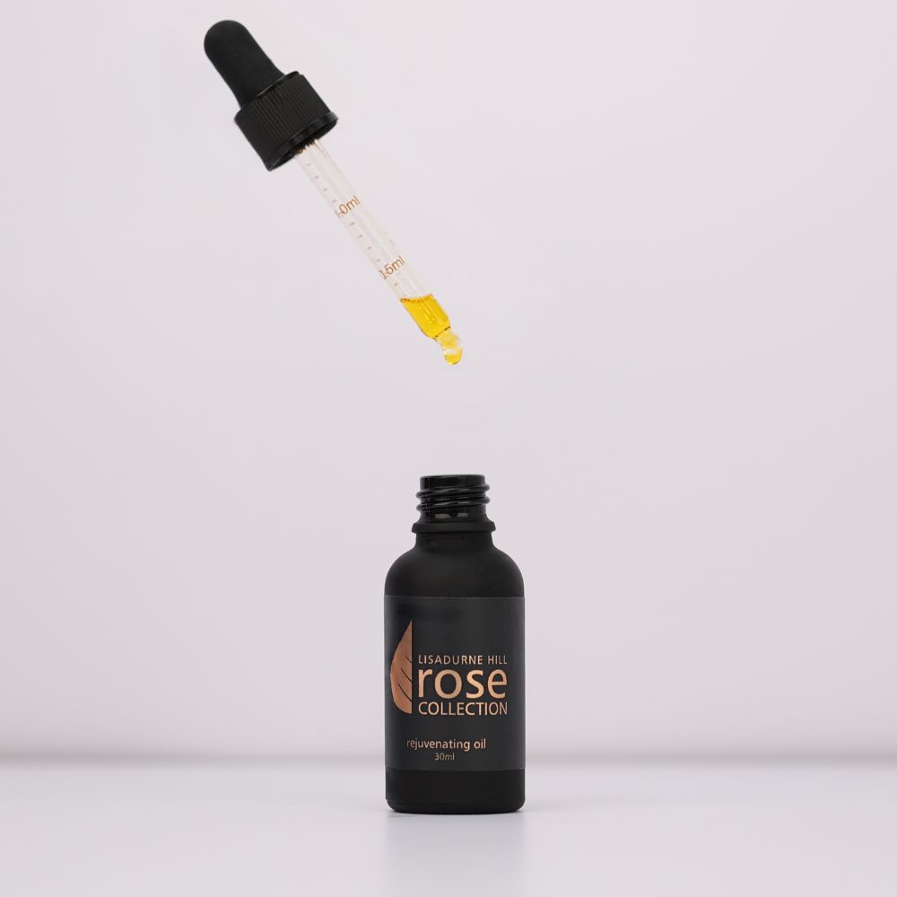 A 30ml bottle of the Rose Collection Rejuvenating Face Oil made from natural, powerful ingredients