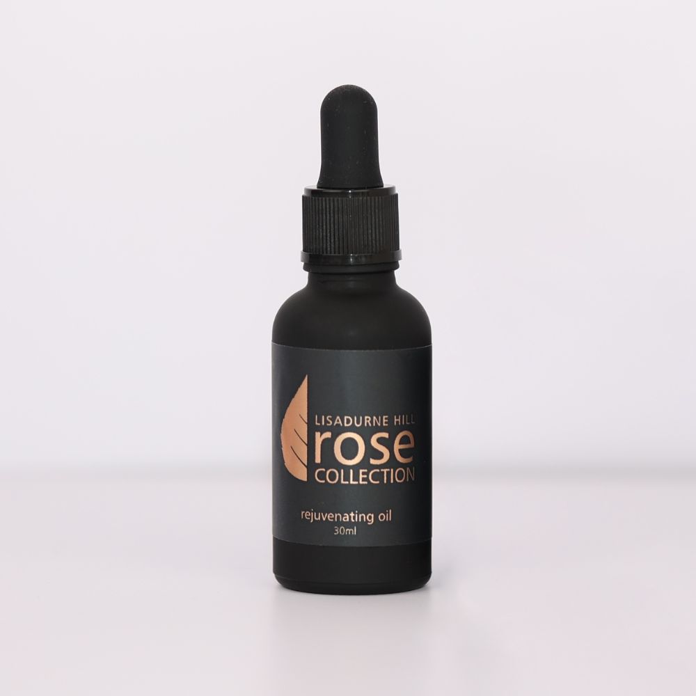 Brown bottle of The Rose Collection Rejuvenating Face Oil